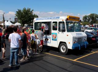 Serving ice cream on a vintage ice cream truck Serving ice cream on a vintage ice cream truck